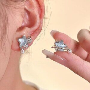 No pierced ears, blue stars, clip-on earrings